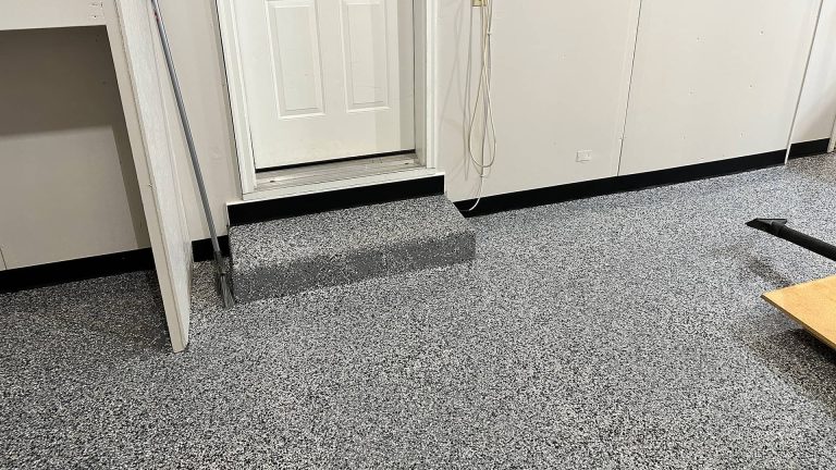 A residential garage after epoxy application