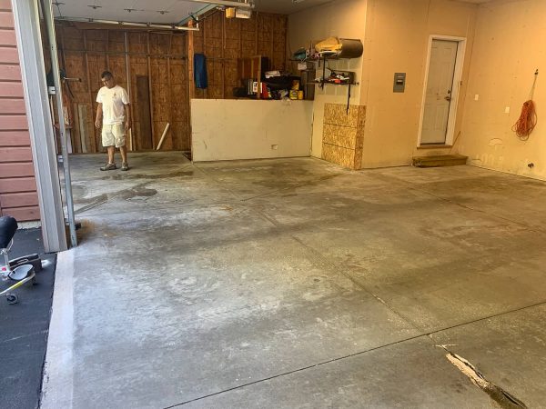 A residential garage being prep for Epoxy floor application