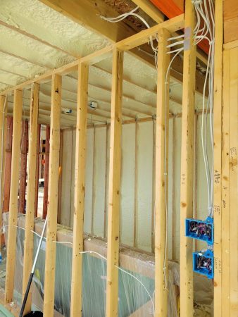 A house that's under construction with spray foam insulation