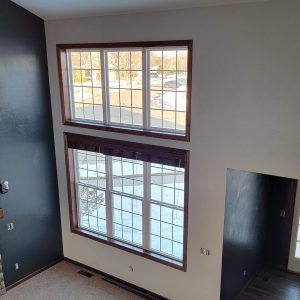 Freshly painted living room in a neutral tone with accent wall — residential interior painting in Appleton, WI